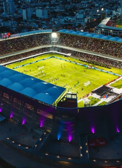 Evening aerial view of football match played at Luis Pirata Fuente Stadium